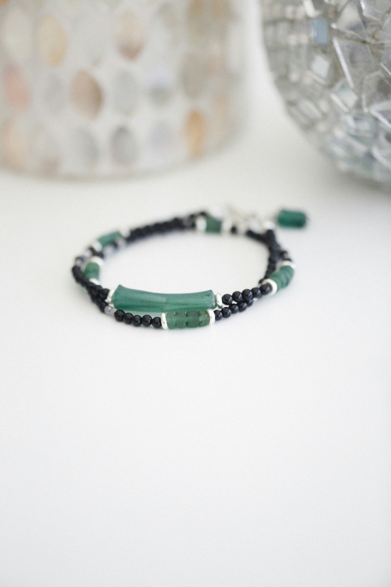 Dainty beaded bracelet on white